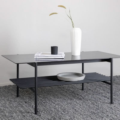 tilbud på Bodia sofabord i marmor, glas og sort metal (60x120 cm). Billigt udsalg! Hurtig levering (1-2 hverdage) og billig fragt. Varenummer: 3NDC-5489.