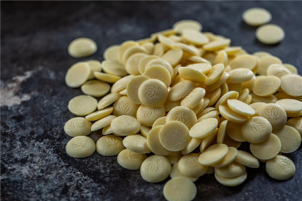 Produktbillede af Chokoladeknapper Edelweiss/hvid 36% 2 Kg på tilbud i premium kvalitet