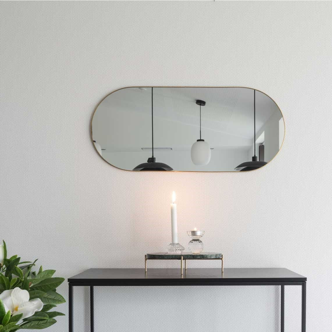 Produktbillede af Cutty Ovalt spejl i størrelse 35 x80 cm messing på tilbud i høj kvalitet