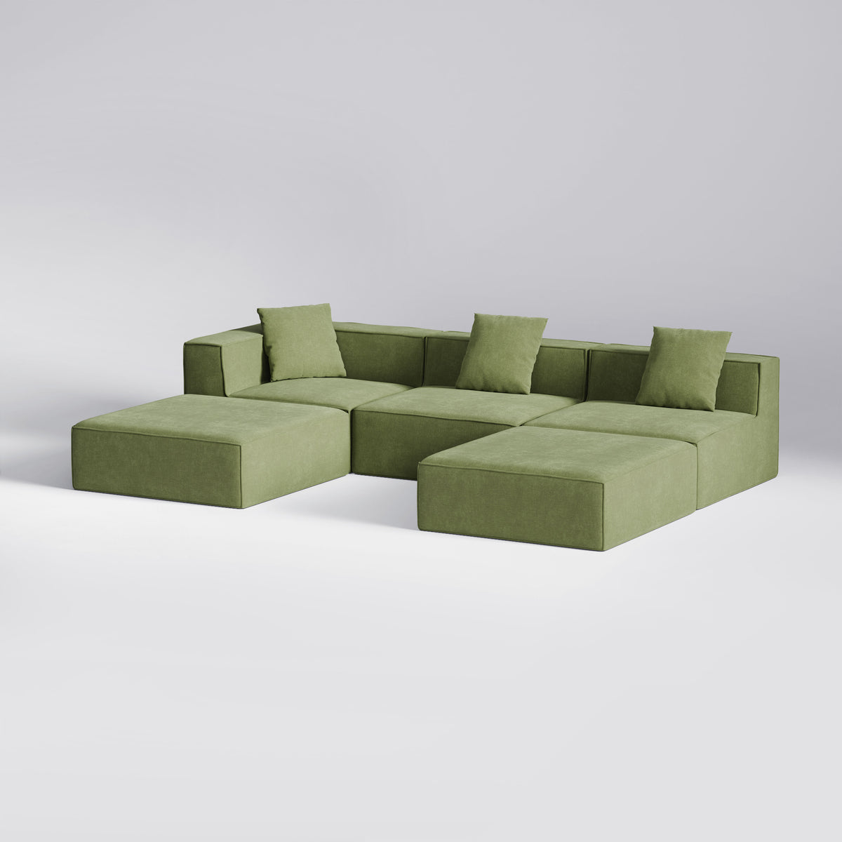 Stor grøn Moduri Lounge modulsofa fra Zederkof med sofa-, hjørne- og pufmoduler