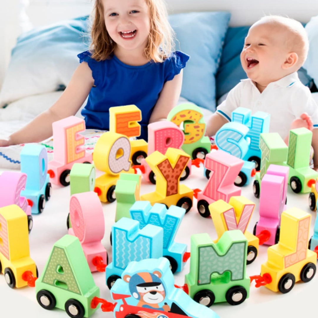 Produktbillede af Køb Alfabet tog m/figurer i træ på tilbud