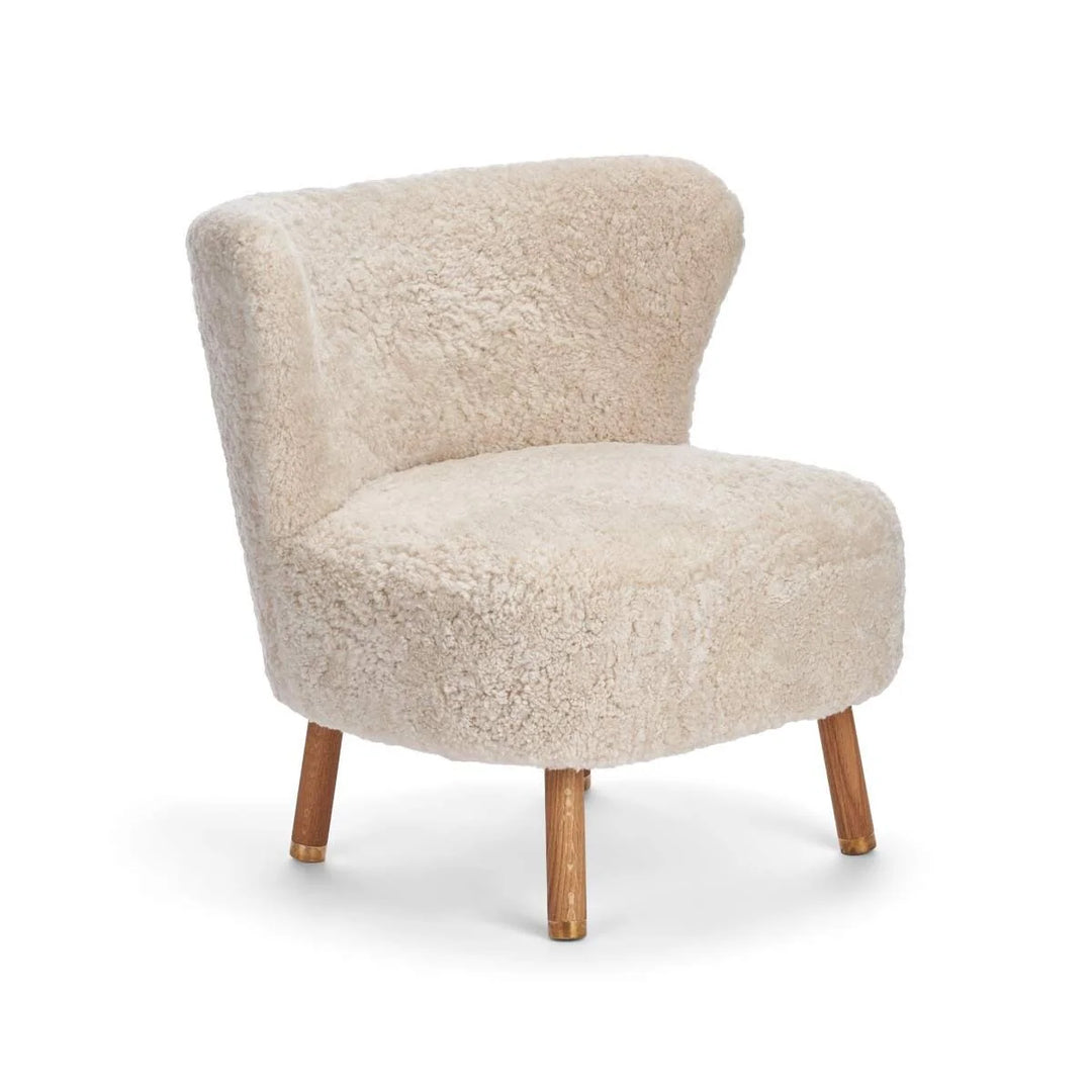 Produktbillede af NATURES COLLECTION EMIL LOUNGESTOL KORTHÅRET BEIGE EG M. MESSING- 82 i premium kvalitet