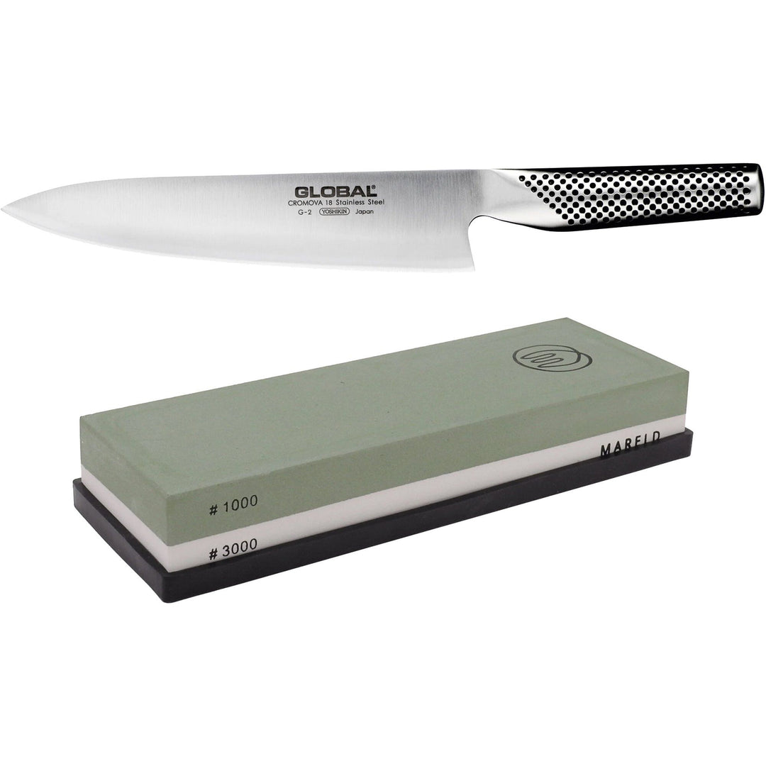 Global Global G-2 Kokkekniv 20 cm + Mareld Slibesten 1000/3000 Grit – billede i brug (Kokkekniv)